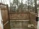 Outdoor wooden deck with railings, great for relaxing or entertaining outside at 10244 Blakeney Preserve Dr, Charlotte, NC 28277