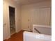 Hallway with a view of the bathroom and a storage closet at 10244 Blakeney Preserve Dr, Charlotte, NC 28277