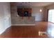 Kitchen with breakfast bar and hardwood floors at 10244 Blakeney Preserve Dr, Charlotte, NC 28277