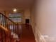 Inviting living room featuring a fireplace and lots of natural light from windows at 10244 Blakeney Preserve Dr, Charlotte, NC 28277