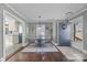 Dining area with glass table and chairs, view of kitchen at 104 E Main St, Cleveland, NC 27013