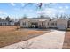 Yellow Ranch home with attached garage at 104 E Main St, Cleveland, NC 27013