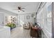 Bright laundry room with washer, dryer, and additional seating area at 104 E Main St, Cleveland, NC 27013