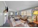 Living room featuring hardwood floors, fireplace and neutral decor at 104 E Main St, Cleveland, NC 27013