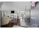 Bright living room featuring hardwood floors and a fireplace at 104 E Main St, Cleveland, NC 27013