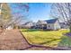 Private backyard with shed and plenty of green space at 1117 Butterburr Dr, Matthews, NC 28104