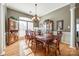 Formal dining room with hardwood floors and chandelier at 1117 Butterburr Dr, Matthews, NC 28104