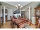 Spacious dining room with hardwood floors and columns at 1117 Butterburr Dr, Matthews, NC 28104