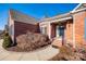 Brick home entrance with a walkway and landscaping at 1117 Butterburr Dr, Matthews, NC 28104