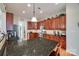 Kitchen with granite countertops, stainless steel appliances, and an island at 1117 Butterburr Dr, Matthews, NC 28104