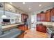 Modern kitchen with granite countertops, stainless steel appliances, and ample cabinet space at 1117 Butterburr Dr, Matthews, NC 28104