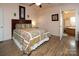 Main bedroom with a queen-size bed and ensuite bathroom at 115 Tradewinds Ct, Mooresville, NC 28115