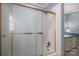 Bathroom with shower/tub combo and tiled walls at 133 Devine St, Stanley, NC 28164