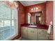 Charming bathroom with updated vanity and window at 133 Devine St, Stanley, NC 28164