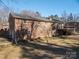 Brick home with attached garage and a deck at 133 Devine St, Stanley, NC 28164