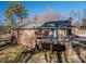 Brick home with a deck and a spacious backyard at 133 Devine St, Stanley, NC 28164