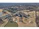 Aerial view of community with golf course and lake at 19107 Wildcat Trl, Davidson, NC 28036