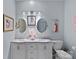 Double vanity bathroom with two sinks and mirrors at 19107 Wildcat Trl, Davidson, NC 28036