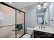 Bathroom with shower, toilet, and vanity at 19107 Wildcat Trl, Davidson, NC 28036