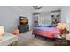 Bedroom with bed, built-in shelves, and TV at 19107 Wildcat Trl, Davidson, NC 28036