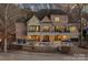 Luxury home exterior at dusk, featuring a large backyard at 19107 Wildcat Trl, Davidson, NC 28036