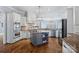 Modern kitchen with white cabinets and granite countertops at 19107 Wildcat Trl, Davidson, NC 28036