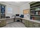 Home office with built-in shelves and desk at 19107 Wildcat Trl, Davidson, NC 28036