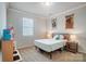 Bedroom with double bed, nightstands and window with blinds at 19117 Hawk Haven Ln, Charlotte, NC 28278