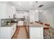 Modern kitchen featuring granite countertops, stainless steel appliances, and white cabinetry at 19117 Hawk Haven Ln, Charlotte, NC 28278