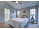 Main bedroom with ensuite bathroom access and natural light at 2025 Sloan Dr, Charlotte, NC 28208