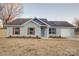 Newly built home with gray siding, brown shutters, and a landscaped yard at 2025 Sloan Dr, Charlotte, NC 28208