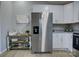 Modern kitchen features stainless steel appliances and white cabinetry at 2025 Sloan Dr, Charlotte, NC 28208