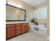 Relaxing bathroom with double vanity and garden tub at 2044 Standing Timber Rd, Lancaster, SC 29720