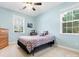 Cozy bedroom with light blue walls and carpeted floor at 2044 Standing Timber Rd, Lancaster, SC 29720