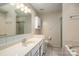 Clean bathroom with vanity, toilet, and shower/tub combo at 209 Meadowridge Dr, Maiden, NC 28650