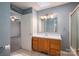 Well-lit bathroom with a vanity and shower at 209 Meadowridge Dr, Maiden, NC 28650