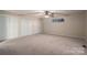 Large bedroom with plenty of closet space and neutral carpet at 209 Meadowridge Dr, Maiden, NC 28650