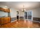 Bright dining room with hardwood floors and access to a deck at 209 Meadowridge Dr, Maiden, NC 28650