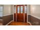 Interior entryway with hardwood floors and wood door at 209 Meadowridge Dr, Maiden, NC 28650