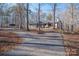 House exterior featuring a carport and long driveway at 209 Meadowridge Dr, Maiden, NC 28650