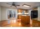 Kitchen features granite countertops and oak cabinets at 209 Meadowridge Dr, Maiden, NC 28650