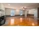 Hardwood floor living room with fireplace and built-ins at 209 Meadowridge Dr, Maiden, NC 28650