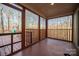 Screened porch overlooking wooded backyard at 209 Meadowridge Dr, Maiden, NC 28650