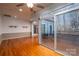 Sunroom with hardwood floors and deck access at 209 Meadowridge Dr, Maiden, NC 28650