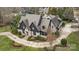 Luxury home with a large backyard and circular driveway at 2130 Ferncliff Rd, Charlotte, NC 28211