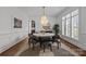 Elegant dining room with round table and chandelier at 2130 Ferncliff Rd, Charlotte, NC 28211