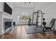 Home gym, with various workout equipment and hardwood floors at 2130 Ferncliff Rd, Charlotte, NC 28211