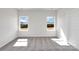 Well-lit bedroom featuring neutral carpeting and two windows at 2242 Catawba Trace Dr, Catawba, NC 28609