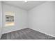 Simple bedroom with gray carpet and a window at 2242 Catawba Trace Dr, Catawba, NC 28609