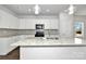 Modern kitchen with white cabinets, granite countertops, and stainless steel appliances at 2242 Catawba Trace Dr, Catawba, NC 28609